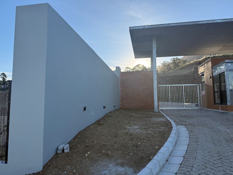 Entrance canopy, gatehouse and boundary wall